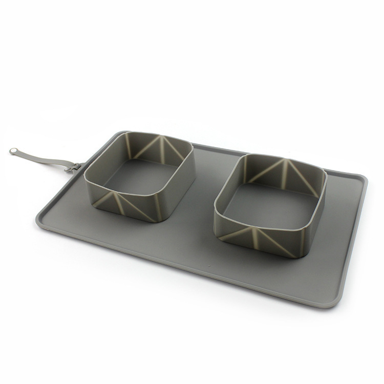 Silicone folding pet bowl by Bucciato, portable and flexible for pets, with a wide base and collapsible design for travel convenience.