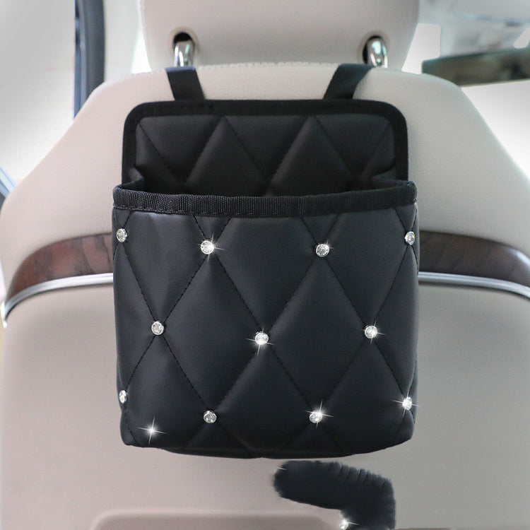 Bucciato Car Storage Bag and Handbag Holder attached to car seat, interior organizer for stowing handbags and small items.