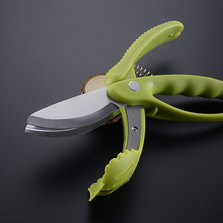 Bucciato multi-purpose kitchen vegetable salad scissors with double-edge serrated blades on a cutting board.