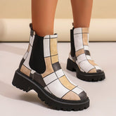 Printed plus-size shaft boots for women with colorful patterns, featuring a stylish design and comfortable fit.