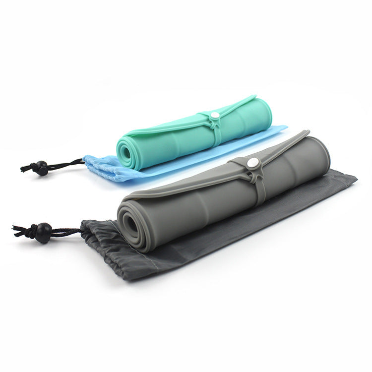 Silicone folding pet bowl by Bucciato, portable and collapsible for easy feeding during travel or outdoor adventures.