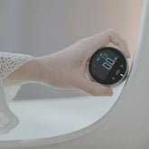Electronic distance measuring instrument with digital LCD display and high-precision electronic ruler for accurate measurements.