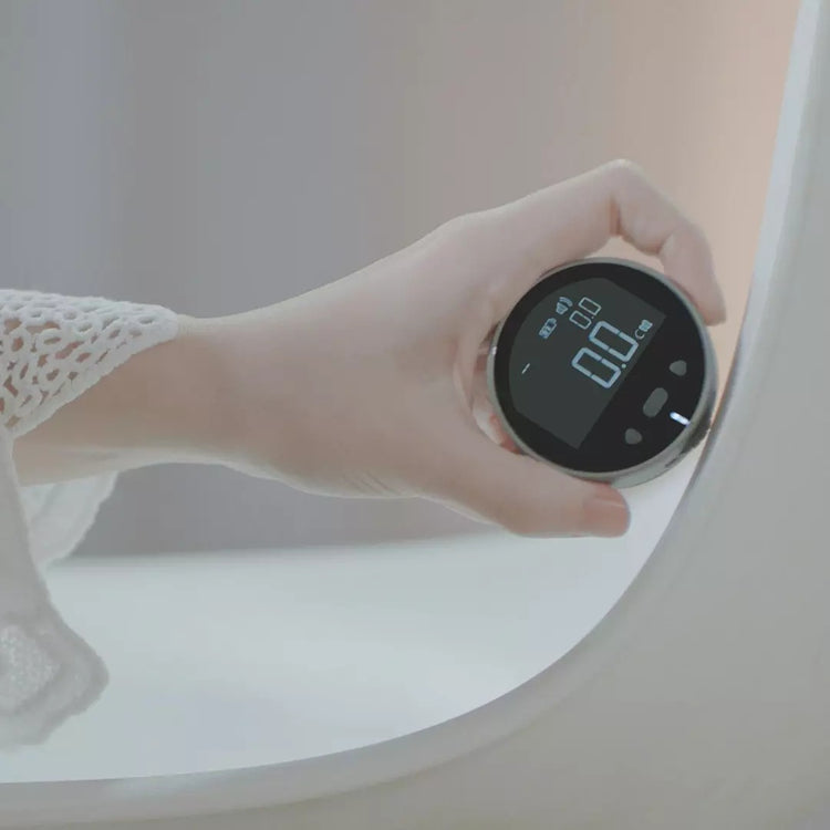 Electronic distance measuring instrument with digital LCD display and high-precision electronic ruler for accurate measurements.