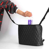 Car seat storage organizer by Bucciato for holding handbags and keeping car interiors tidy with a convenient middle seat holder.
