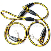 Double-ended dog traction rope with hand grips and collars, ideal for walking and training pets.