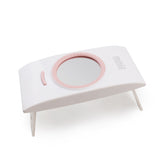 Foldable portable nail phototherapy machine by Bucciato, compact design with LED light for effective nail treatment.