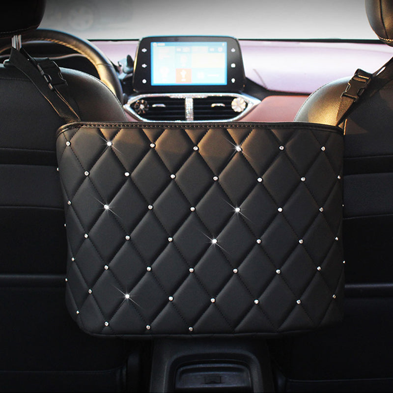 Bucciato car seat storage organizer holding a handbag between car seats, designed to keep bags tidy and secure inside the vehicle.