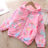 Colorful graffiti jackets for children and babies, stylish spring and summer outerwear from Bucciato, featuring vibrant urban designs.