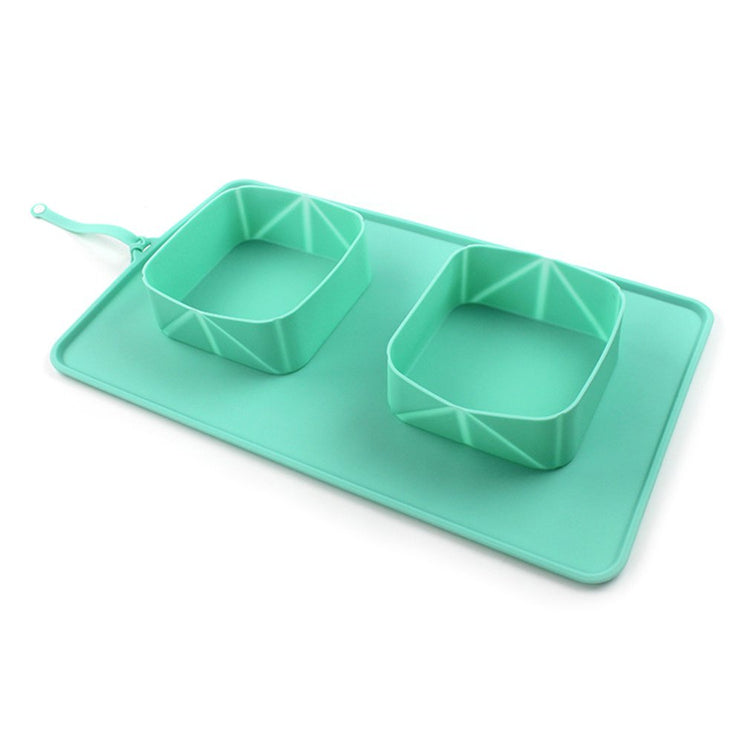 Silicone folding pet bowl in blue, portable and flexible for feeding pets on the go, ideal for travel and outdoor use.