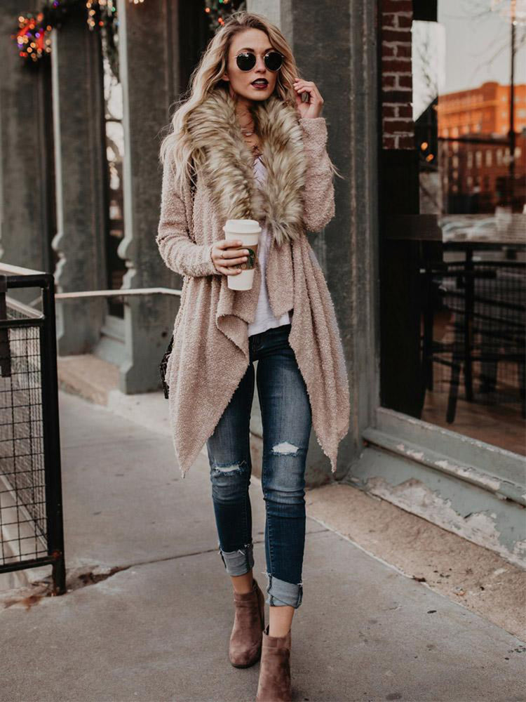 Women’s plush trench coat with fur collar, stylish outerwear by Bucciato featuring a cozy, elegant design and button closure.