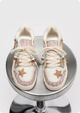 Pair of Bucciato platform sneakers with star pattern, stylish high-end footwear designed for couples.