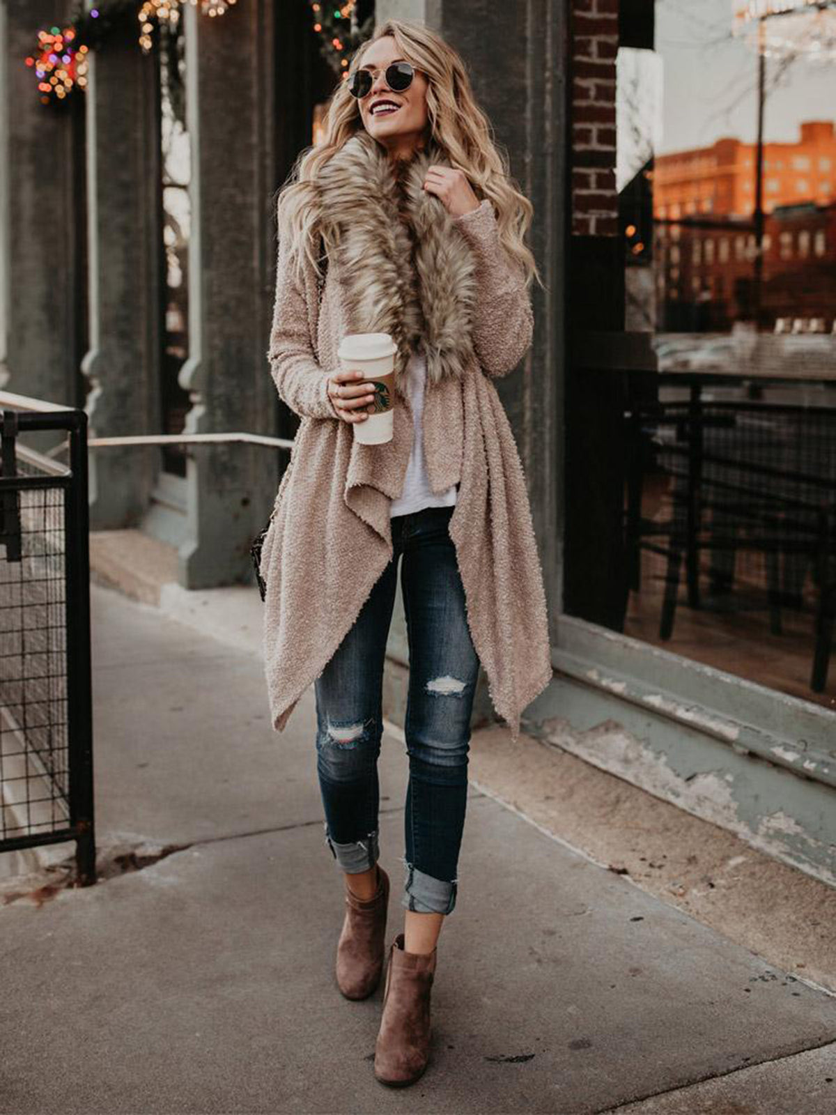 Women’s plush trench coat with fur collar from Bucciato, featuring a stylish outerwear design and cozy, soft fabric.