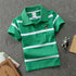 Boy wearing a college style short sleeve polo T-shirt in classic design, blue color, from Bucciato Multi-Product Store.