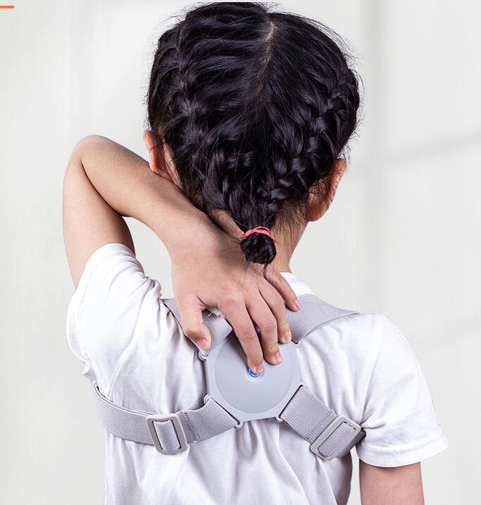 Adjustable smart back posture corrector in black, designed to improve spinal alignment and support for better posture.