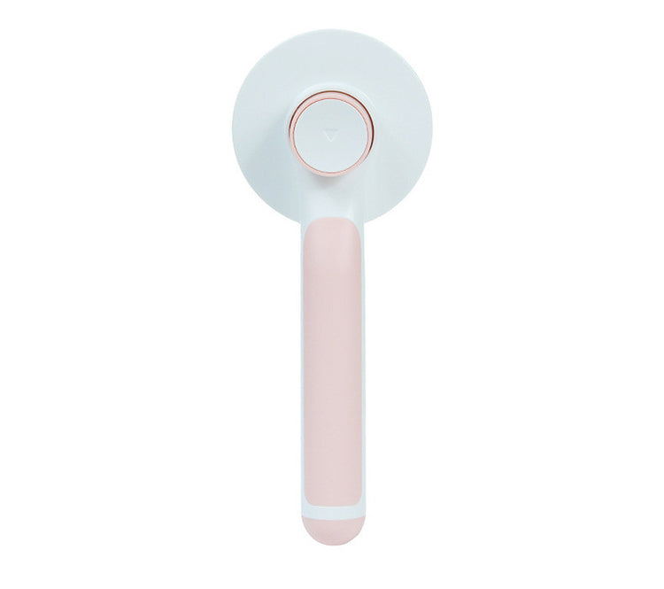 Round handle pet massage comb by Bucciato, featuring flexible teeth for gentle grooming and soothing pet massages.