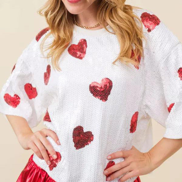 European and American style sequin half sleeve T-shirt with round neck, festive Christmas design, by Bucciato.