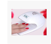 Small mini nail dryer with portable UV LED light for quick, easy nail curing, ideal for at-home or on-the-go manicures.