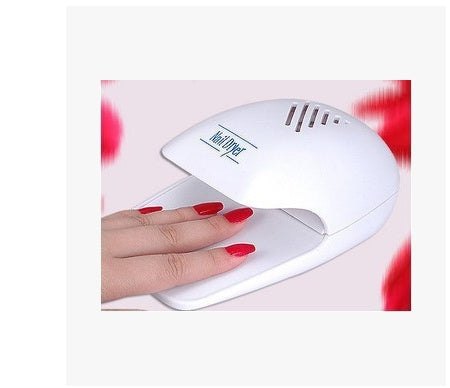 Small mini nail dryer with portable UV LED light for quick, easy nail curing, ideal for at-home or on-the-go manicures.