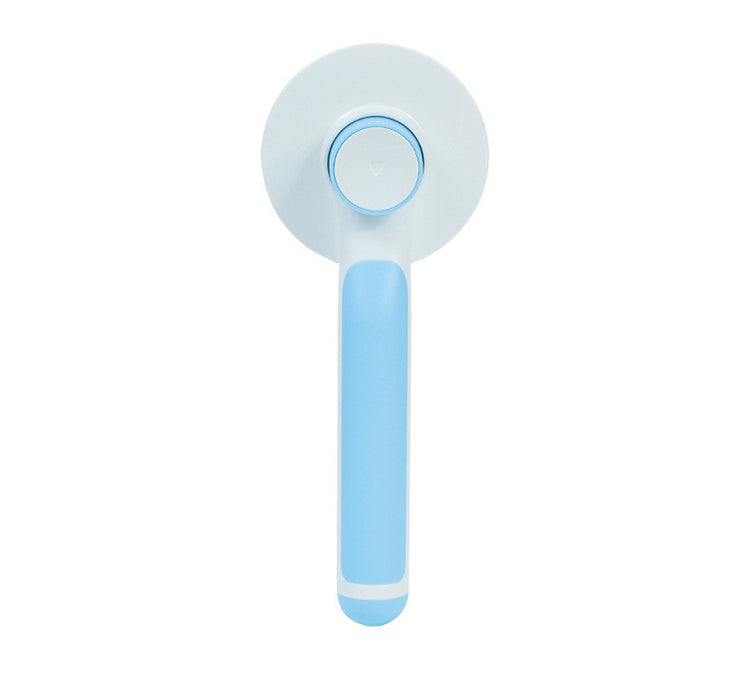 Round handle pet massage comb with ergonomic grip, designed to gently groom and soothe cats and dogs.