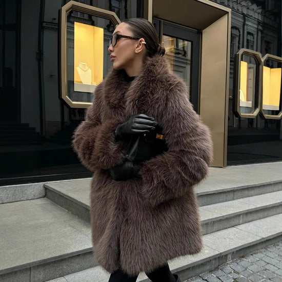 Soft mid-length faux fur coat for women with a Peter Pan collar, featuring plush texture and stylish design.