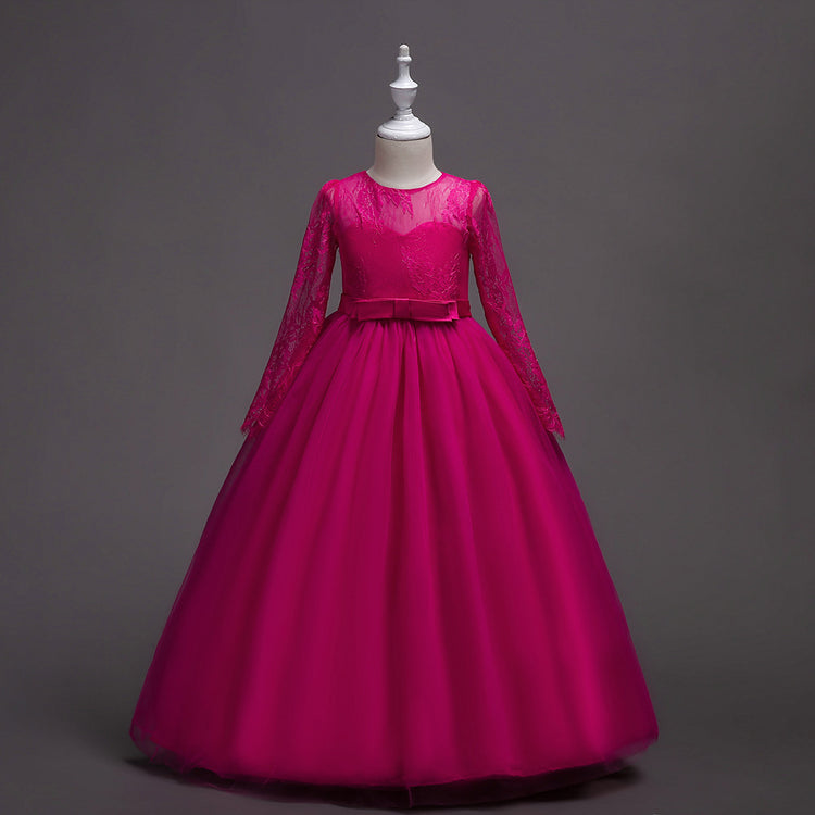 Long flower girl dress for kids with floral details, pink and white fabric, and elegant design by Bucciato.