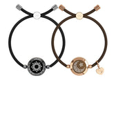 Pair of Sun-Moon Smart Sensing Couple Bracelets by Bucciato, showcasing sleek design and smart sensing features for couples.