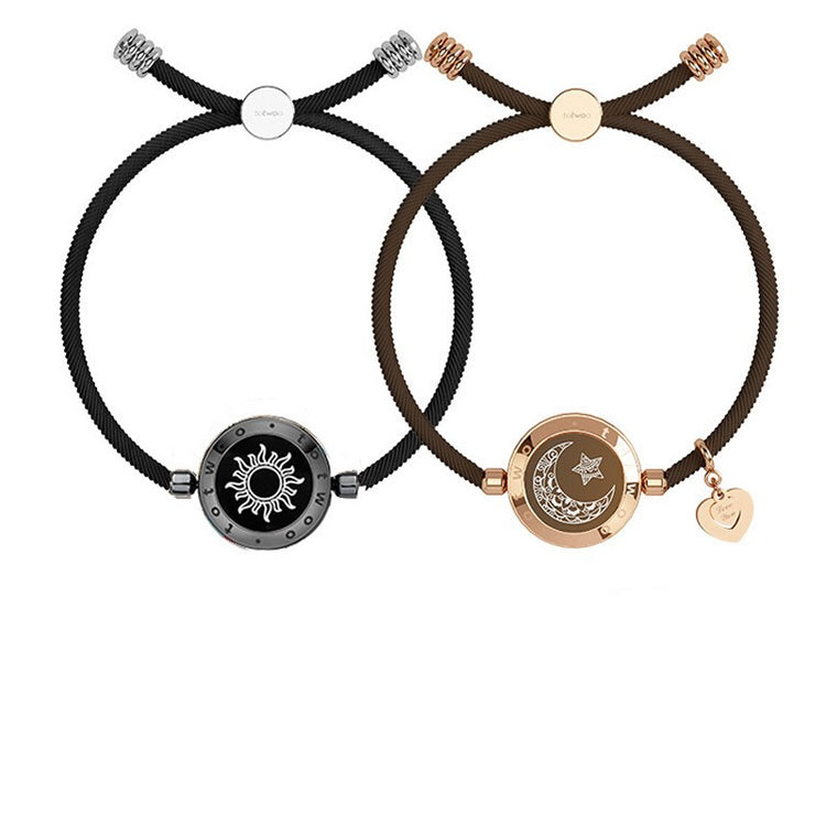 Pair of Sun-Moon Smart Sensing Couple Bracelets by Bucciato, showcasing sleek design and smart sensing features for couples.