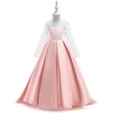 Girls’ mesh long sleeve trailing dress by Bucciato, perfect for occasions and parties, featuring a stylish and elegant design.