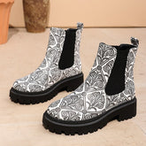 Printed plus-size shaft boots for women with bold patterns and comfortable fit, featuring a stylish design.
