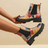 Printed plus-size shaft boots for women featuring bold patterns and a comfortable fit, stylishly displayed on a plain background.