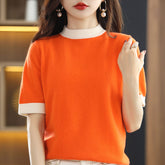 Wool knitted half turtleneck top with loose fit, short sleeves in neutral tones, stylish and cozy for casual wear.
