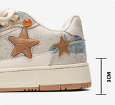 Pair of high-end platform sneakers with star pattern for couples, featuring stylish design and comfortable sole by Bucciato.