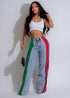 Stylish patchwork striped contrasting denim jeans for women, featuring luxury designer details and multi-tone denim fabric.