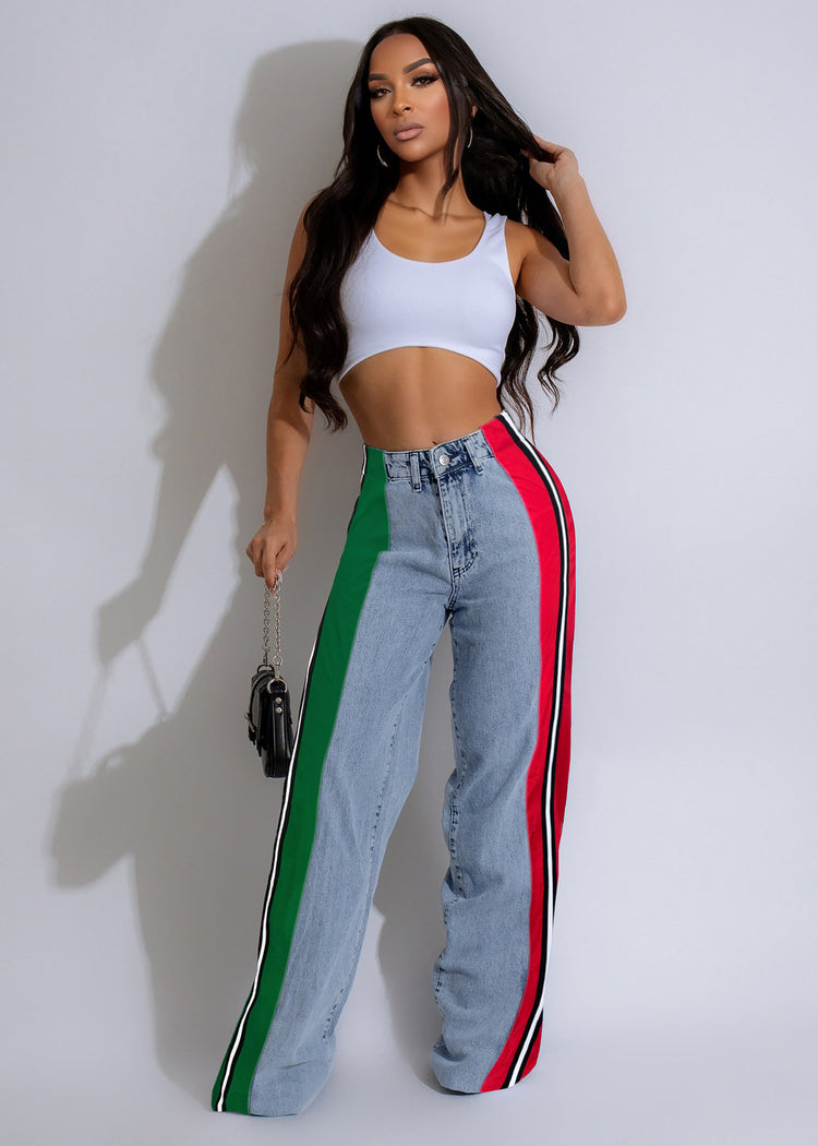 Stylish patchwork striped contrasting denim jeans for women, featuring luxury designer details and multi-tone denim fabric.