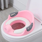 Children’s foldable portable toilet pad by Bucciato, compact and lightweight for travel and outdoor use.