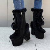 Women’s designer mid-cut furry boots by Bucciato, featuring plush fur detail and stylish winter footwear for women.