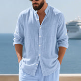 Men’s breathable linen button-up shirt with stand collar and long sleeves, stylish and lightweight for comfortable wear.