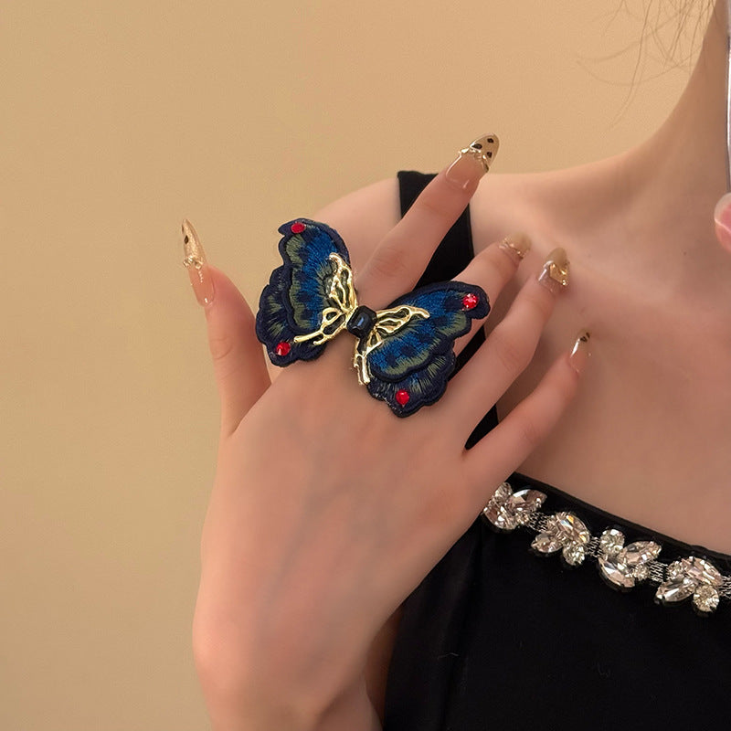 MidRange Womens DiamondEncrusted Embroidered Butterfly Tassel Earrings A Lightly Luxurious HighEnd Accessory