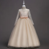 Long flower girl dress for kids by Bucciato, featuring floral details and elegant design perfect for special occasions.
