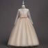 Long flower girl dress for kids by Bucciato, featuring floral details and elegant design perfect for special occasions.