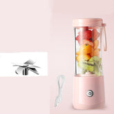 Mini electric portable juice machine by Bucciato, showing compact design with a clear container and juicing blades inside.