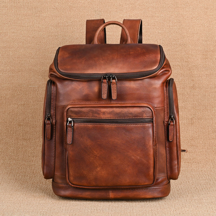 Genuine retro double-layer cowhide backpack for men with outdoor leisure style, featuring multiple compartments and sturdy leather construction.