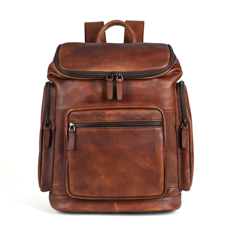 Genuine retro double-layer cowhide backpack for men, outdoor leisure travel bag in brown with adjustable straps and multiple compartments.