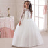 Long flower girl dress for kids featuring floral patterns and pastel colors, perfect for special occasions and formal events.