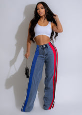 Stylish patchwork striped denim jeans for women with contrasting design, featuring luxury designer craftsmanship.