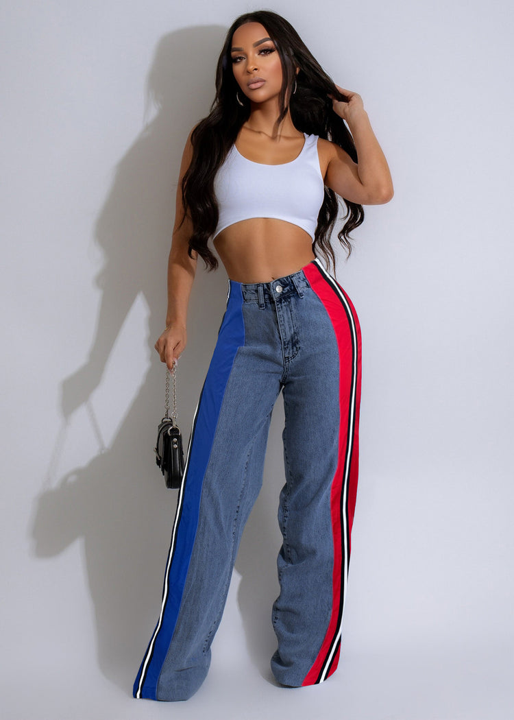 Stylish patchwork striped denim jeans for women with contrasting design, featuring luxury designer craftsmanship.