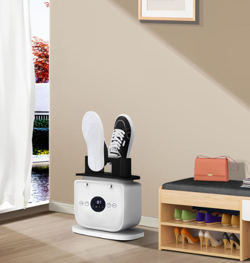 Automatic portrait inflatable ironing and drying machine by Bucciato, showing the all-in-one clothes drying and ironing device in action.