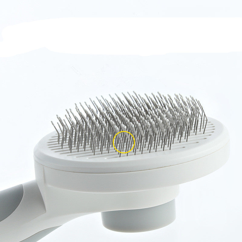 Round handle pet massage comb by Bucciato, featuring fine teeth for gentle grooming and massage of dogs and cats.