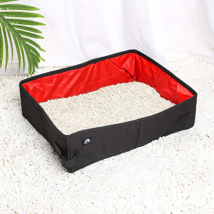 Foldable waterproof pet litter box made of Oxford cloth, portable and lightweight for easy cleaning and travel.