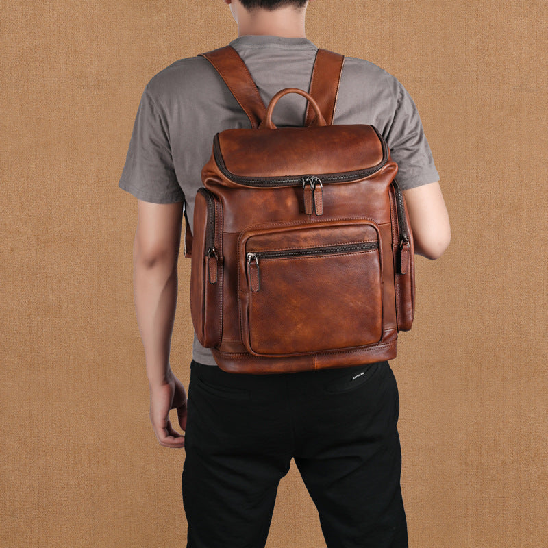 Genuine retro double-layer cowhide backpack for men, outdoor leisure travel backpack with multiple compartments and vintage style
